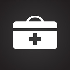 First aid kit on black background icon
