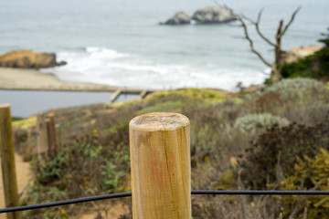 Fototapeta premium The view in Lands End, San Francisco. summer , cloud , rock , plant, sea