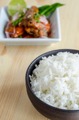 Spicy salad of canned sardines fish and cooked rice in bowl , meal of Thai food
