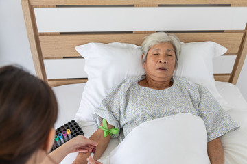 nurses use syringe blood  elderly female patients