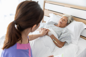 Obraz premium nursing care for elderly female patient