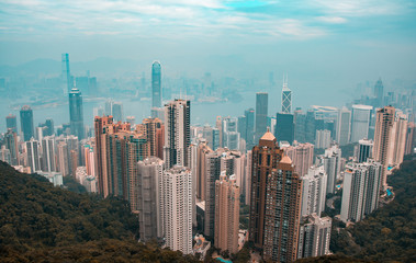 Fototapeta na wymiar Orange and teal view of Hong Kong skyline from Victoria's peak