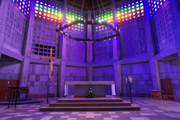 Baccarat,France-October 11, 2018: The interior of Saint Remy church in Baccarat illuminated by colorful crystals on the wall. 