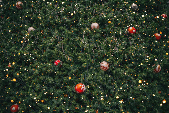 Vintage Christmas tree with ball decoration and sparkle light filter effect. Christmas and New Year holiday background. vintage color tone.