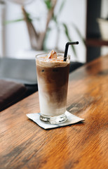 Glass Of Cold Coffee On Wood