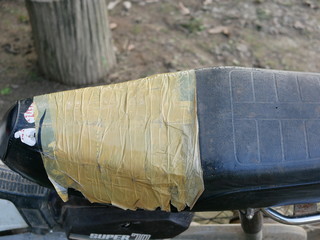 Motorbike seat was repaired using duck tape