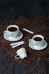 Coffee bean on wood and coffee cup is aroma