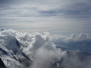 Fototapeta na wymiar Beauty of European Mountains - Snow and Clouds