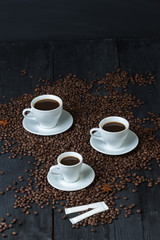 Coffee bean on wood and coffee cup is aroma