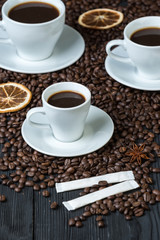 Coffee bean on wood and coffee cup is aroma