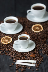 Coffee bean on wood and coffee cup is aroma