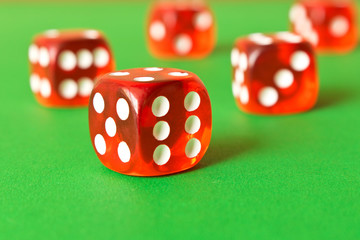 Dice on a green background . Game concept. Games of chance