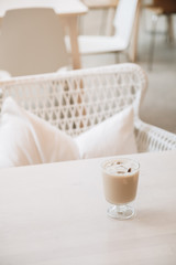 Homemade Taiwan Milk Tea served on the white wooden table in the cafe