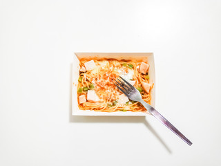 Spaghetti warm with microwave in paper box.