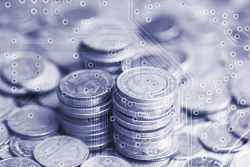 Double exposure of stack of coins and graphics card for business finance concept