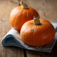 Ripe pumpkin on wooden desk