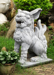 Chinese lion at the entrance of a temple