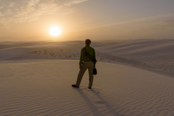 A Traveller enjoys sunset at White Sands National Monument