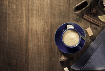 cup of coffee on wood