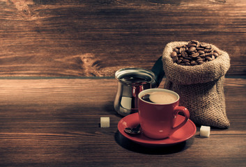 cup of coffee on wood