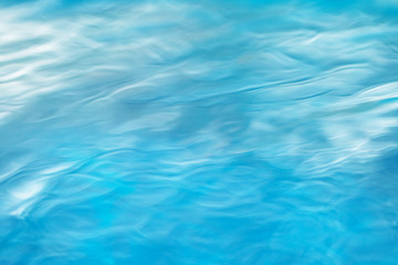 The smooth natural blue water background with bokeh  abstract on the sea or ocean,vintage and soft...