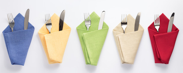 knife and fork in folded napkin