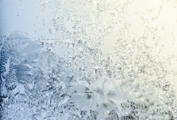Winter frostwork on window glass