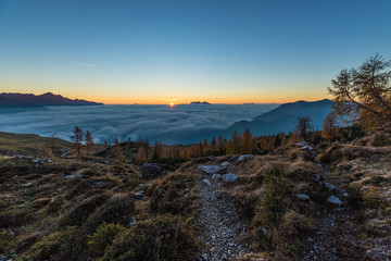 Colorful Autumn Sunrise Above The Clouds In The Lienz Dolomites Above Hochstadelhaus