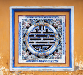 Fototapeta na wymiar Chinese symbol of wealth made of ceramic