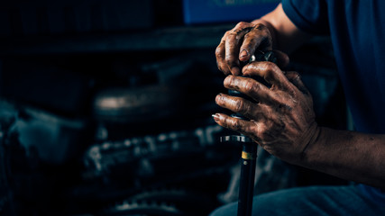 Checking a car suspension for repair at car garage