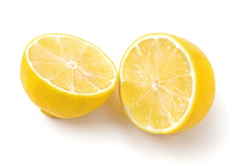 two halves of ripe lemon fruit isolated on white background