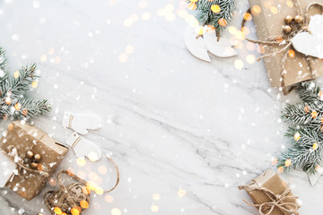 Christmas handmade gift boxes on white marble background top view. Merry Christmas greeting card,...