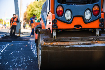 
laying asphalt on the new road