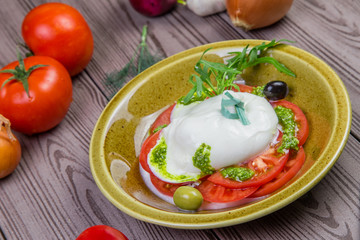 burrata, fresh italian cheese and fresh vegetables
