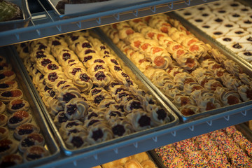 food at the desert counter with different pastries