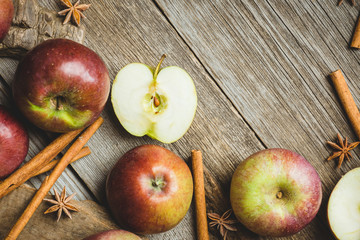 Fresh ripe apples on the wooden background. Selective focus. Shallow depth of field.
