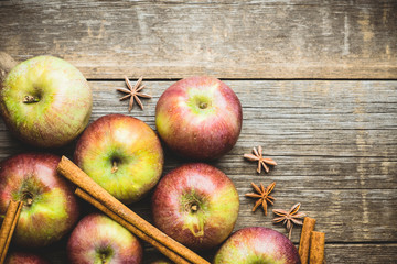 Fresh ripe apples on the wooden background. Selective focus. Shallow depth of field.