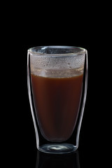 Double-walled glass with coffee isolated on black. Photo with clipping path.