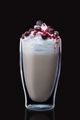 Double-walled glass with coffee cocktail  isolated on black. Photo with clipping path.