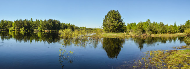 Spring panoramic water landscape of Central Russia.