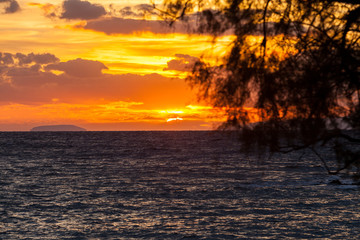 Sunrise or sunset over sea surface
