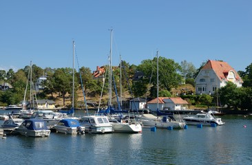 Fototapeta na wymiar Nynäshamn Archipelago with marina in summer and blue sky
