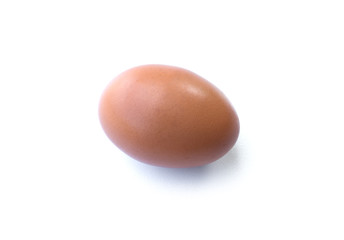 Close up of chicken egg isolated on white background