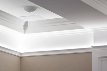 Interior details ceiling stucco plaster. Decorating wall joint using lighting