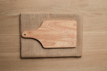 wooden table top with Kitchen ware for background