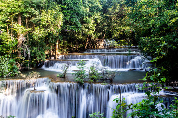 Fototapeta na wymiar Landscape photo, Huay Mae Kamin Waterfall,Amazing waterfall in wonderful autumn forest, beautiful waterfall in rainforest at Kanchanaburi province, Thailand