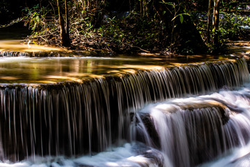 Landscape photo, Huay Mae Kamin Waterfall,Amazing waterfall in wonderful autumn forest, beautiful waterfall in rainforest at Kanchanaburi province, Thailand