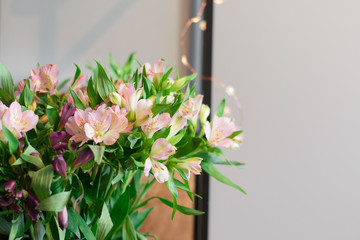 Bunch of flowers. Fresh flowers on light background. Flowers composition. Colorful spring flowers
