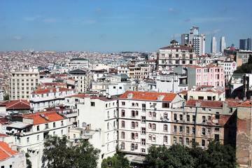 Fototapeta na wymiar View of old white mediterranean houses with red roofs in Lisbon, Portugal