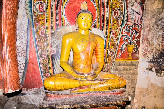 Buddha statues inside Dambulla Cave Temple. Cave Temple is a World Heritage Site near Dambulla city. Sri Lanka.